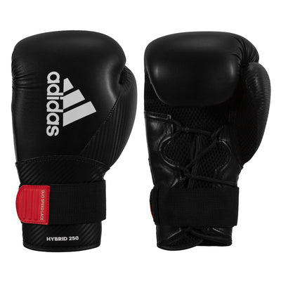 a pair of black adidas boxing gloves on a white background