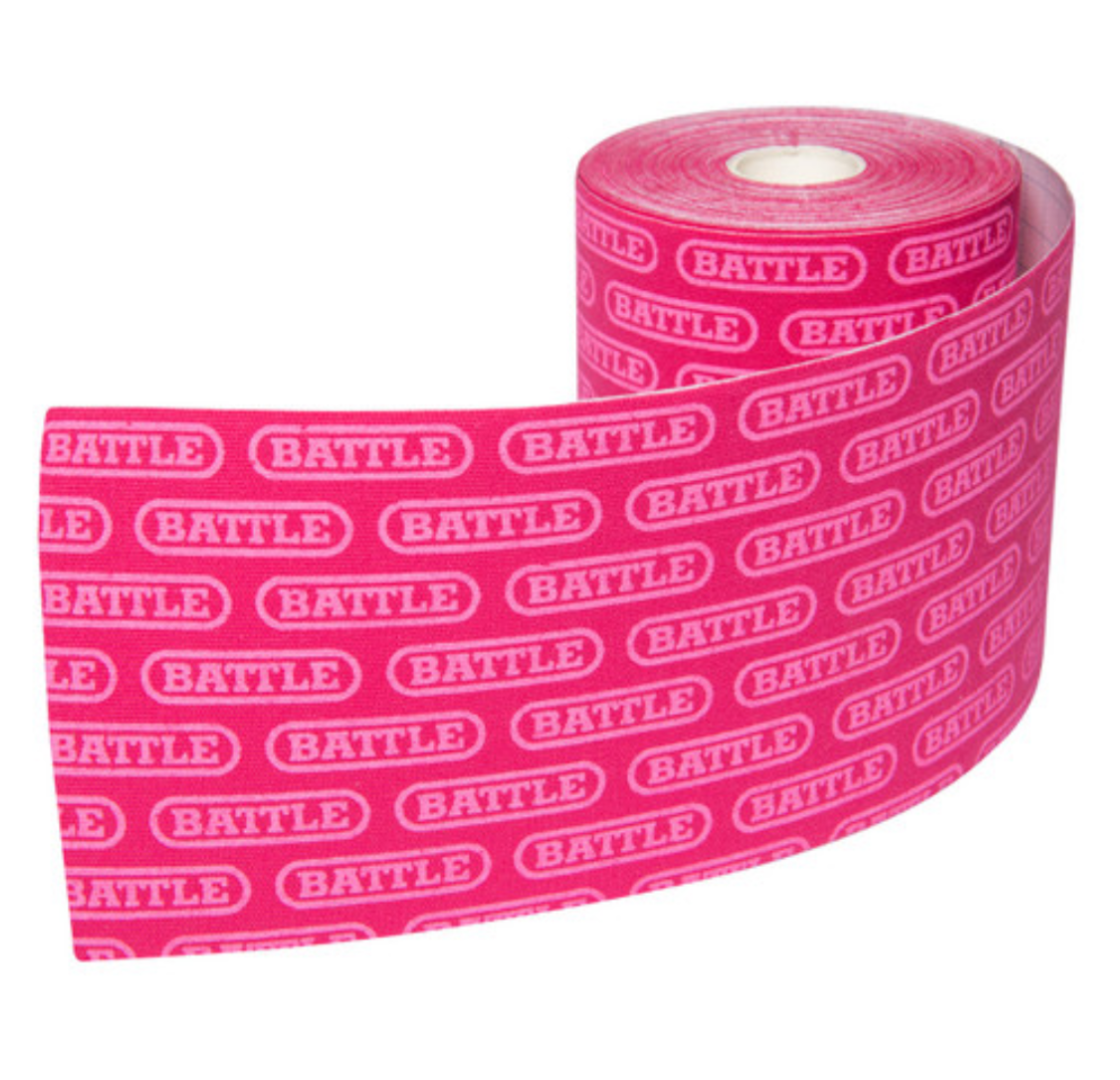 a roll of pink battle tape on a white background