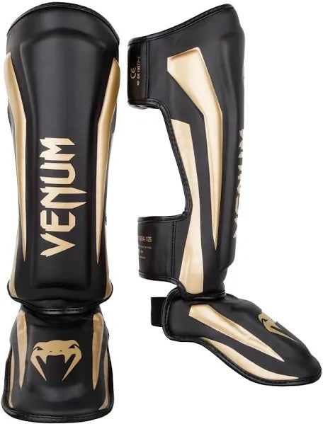 Venum Elite Shin Guards - black and gold