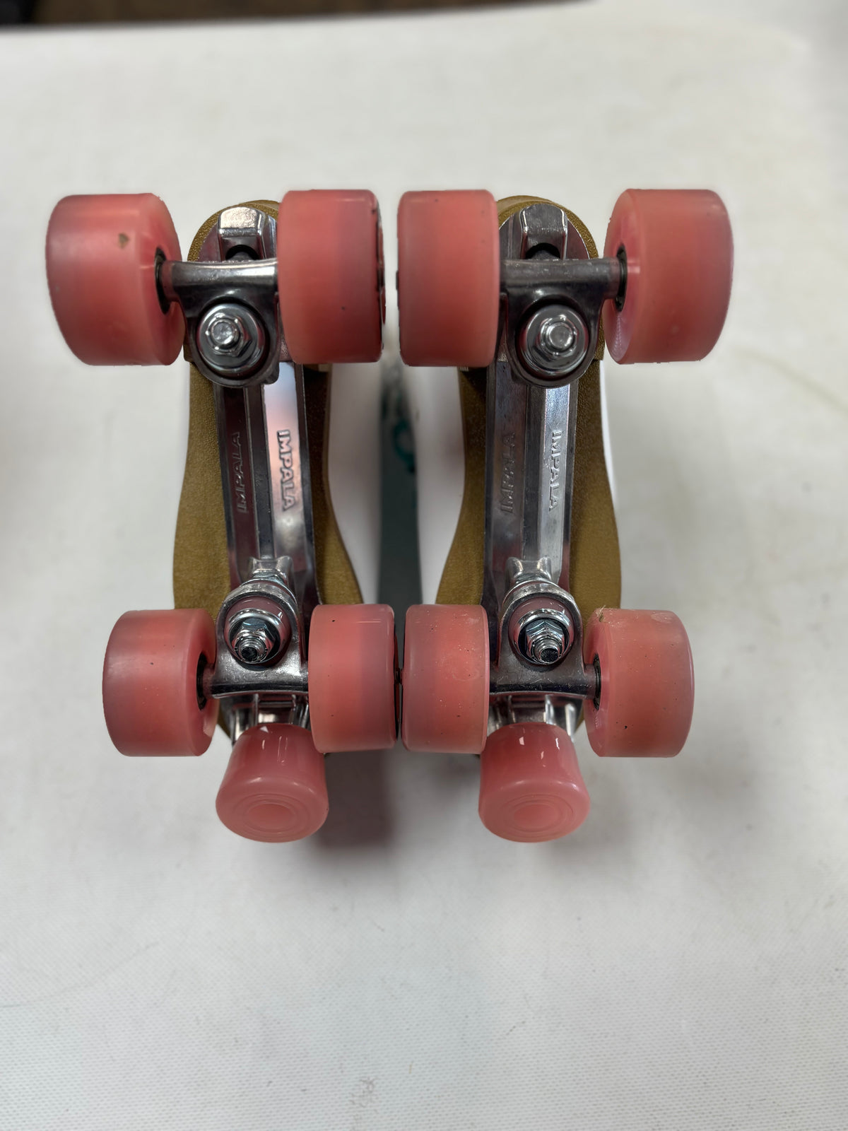 White Impala Rollerskates Size 7 (used)
