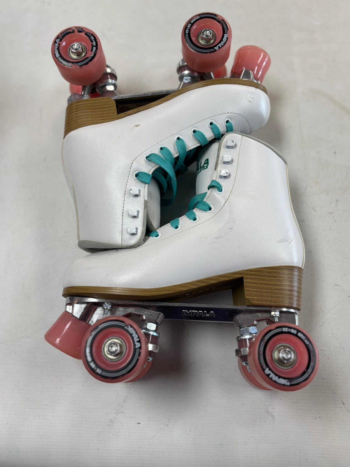 White Impala Rollerskates Size 7 (used)
