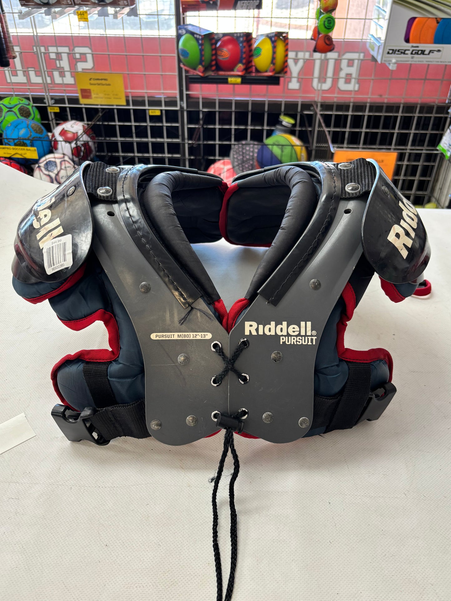 Riddell Pursuit Youth Medium Shoulder Pads (used)