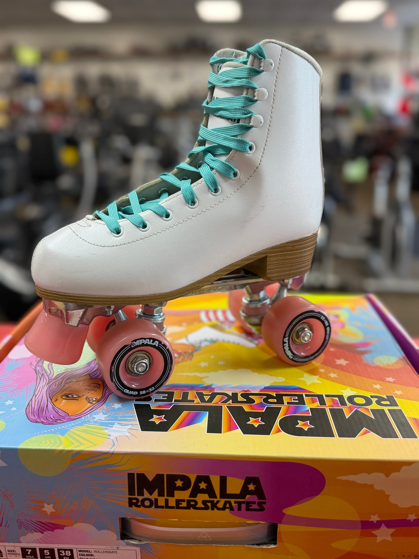 White Impala Rollerskates Size 7 (used)