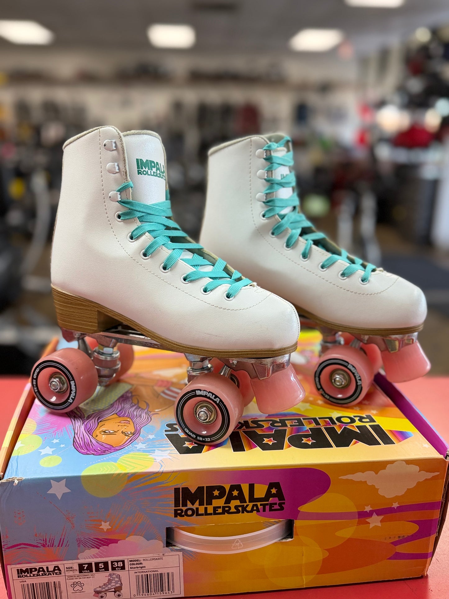 White Impala Rollerskates Size 7 (used)