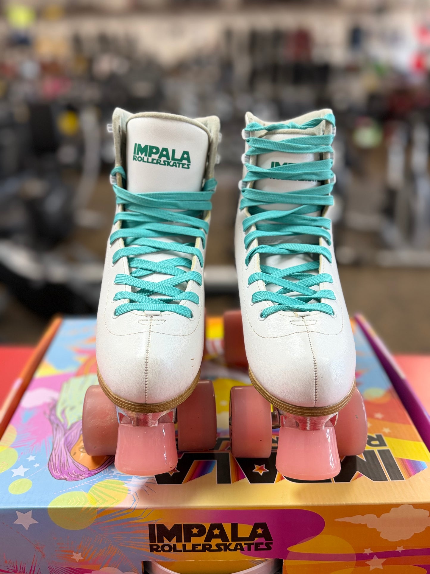 White Impala Rollerskates Size 7 (used)