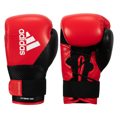 a pair of red adidas boxing gloves on a white background
